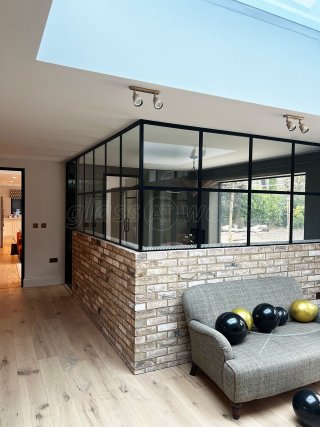 9stories Interior Design (Sevenoaks, Kent): T-Bar Black Framed Glass Corner Room with Half Height Wall