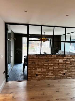 9stories Interior Design (Sevenoaks, Kent): T-Bar Black Framed Glass Corner Room with Half Height Wall