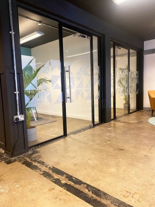 Carbon Futures (Glasgow, Scotland): Side-by-side Glass Office Partitions