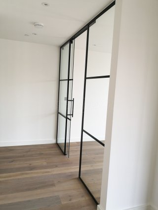 Dawlish Construction (Stepney, London): T-Bar Black Panel Glass Walls and Sliding Doors