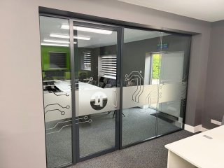 Distributed Micro Technology (Sandhurst, Berkshire): Double Glazed Acoustic Glass Partition With Anthracite Grey Trackwork
