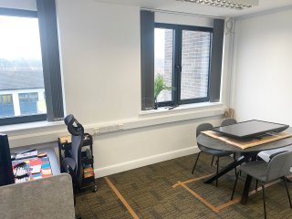 Downriver (Orpington, Kent): T-Bar Banded Glass Corner Office