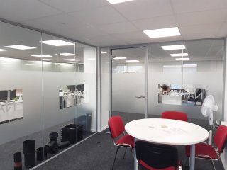 Naylor Industries Plc (Barnsley, South Yorkshire): Acoustic Glass Corner Office With Window Film Logo
