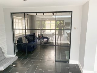 Domestic Project (Ampthill, Bedfordshire): Slimline T-Bar Anthracite Grey Framed Glazing With Frameless Glass Sliding Doors