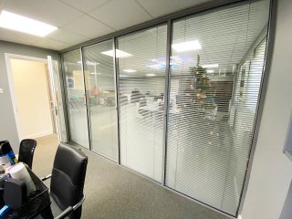 Cooper and Kelling Builders (Halstead, Essex): Glass Office Wall With Built-in Venetian Blinds.