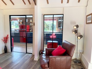 Residential Project (Pwllheli, Wales): T-Bar Black Framed Glass Door and Side Panel