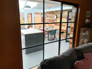 Residential Project (Cumbernauld, Glasgow): Warehouse-Effect Black Steel-Style Glass Wall