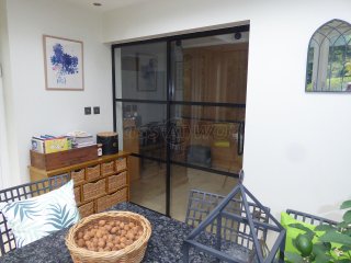 Domestic Project (Liss, Hampshire): T-Bar Glass Sliding Door and Side Panel