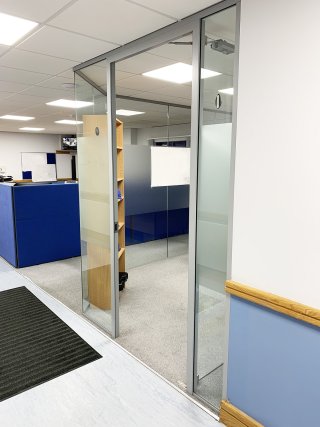 Isoma Limited (Swadlincote, Derbyshire): Laminated Acoustic Glass Corner Room With Logo
