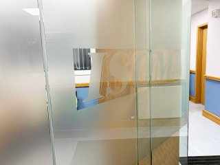 Isoma Limited (Swadlincote, Derbyshire): Laminated Acoustic Glass Corner Room With Logo
