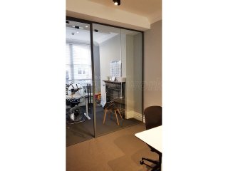 Blacks Visual Merchandising Ltd (Mayfair, London): Laminated Acoustic Glass With Framed Door [Basalt grey RAL 7012]