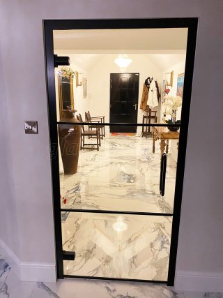 Domestic Project (Kettering, Northamptonshire): Black Framed Metal and Glass Door