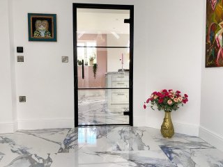Domestic Project (Kettering, Northamptonshire): Black Framed Metal and Glass Door