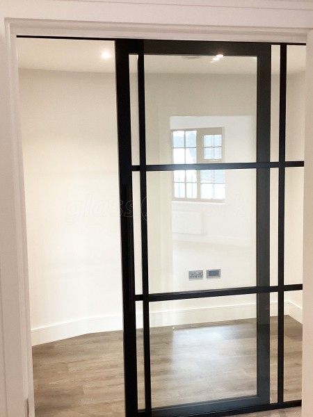 Chase New Homes Limited (Hertford, Hertfordshire): T-Bar Glazed Partitioning with Framed Sliding Door Leaves in multiple Properties