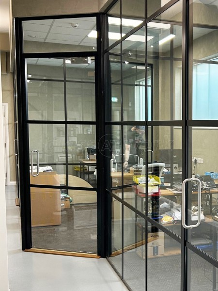 Cox Workshops (Tottenham, London): T-Bar Black Framed Office Partitions With Acoustic Glazing