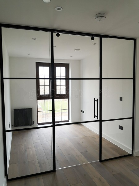 Dawlish Construction (Stepney, London): T-Bar Black Panel Glass Walls and Sliding Doors