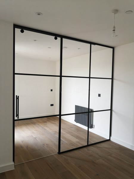 Dawlish Construction (Stepney, London): T-Bar Black Panel Glass Walls and Sliding Doors