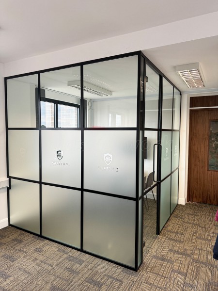 Downriver (Orpington, Kent): T-Bar Banded Glass Corner Office