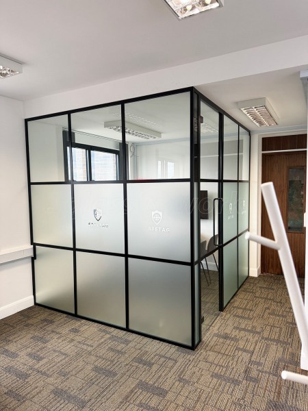 Downriver (Orpington, Kent): T-Bar Banded Glass Corner Office