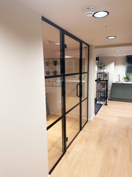 Fortis Vision (Tottenham, London): Laminated Acoustic T-Bar Banded Glass Partition