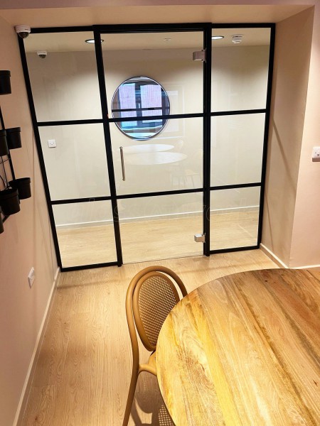 Fortis Vision (Tottenham, London): Laminated Acoustic T-Bar Banded Glass Partition