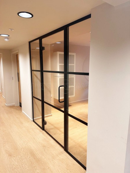 Fortis Vision (Tottenham, London): Laminated Acoustic T-Bar Banded Glass Partition