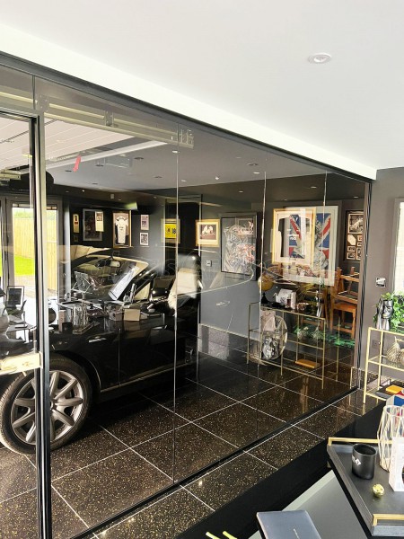 RE-Q 23 Construction Limited (York, North Yorkshire): Bronzed Glass Partitions With Black Tracks For Garage and Home Gym