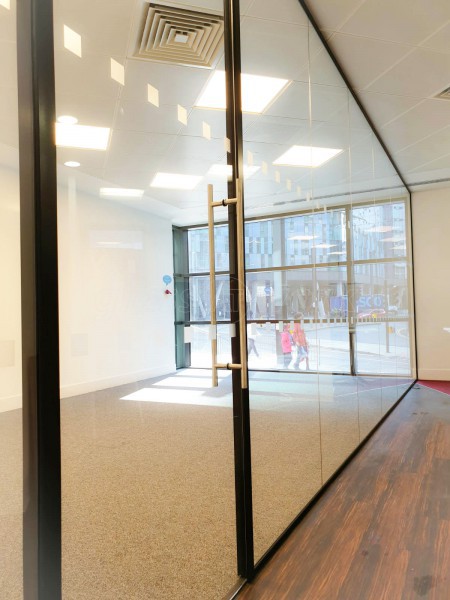 Rise Interiors (Croydon, London): Frameless Commercial Glass Office Fit-Out With Black Track