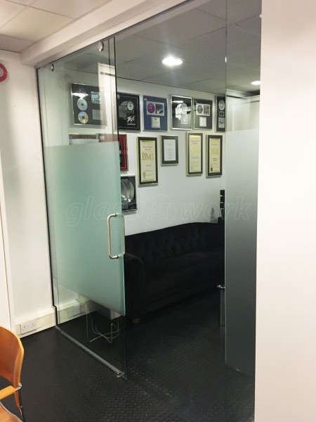 Reservoir / Reverb Music Ltd (Chiswick, London): Small Sliding Glass Door Partition