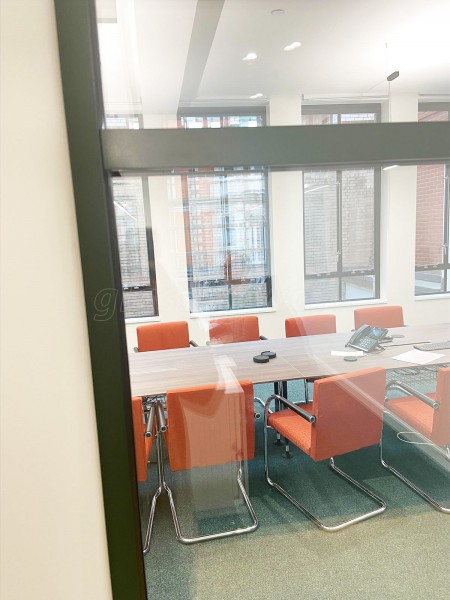 A.S.K Partners Limited (Harley Street, London): Double Glazed T-Bar Office Partitions Using Metal Bottle Green Trackwork