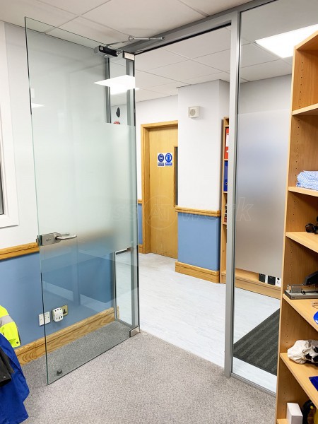 Isoma Limited (Swadlincote, Derbyshire): Laminated Acoustic Glass Corner Room With Logo