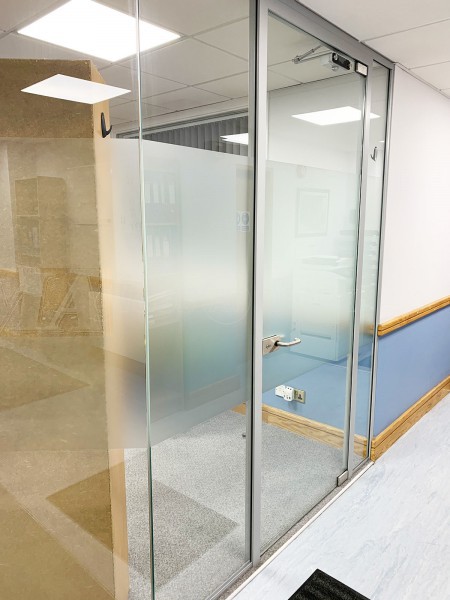 Isoma Limited (Swadlincote, Derbyshire): Laminated Acoustic Glass Corner Room With Logo