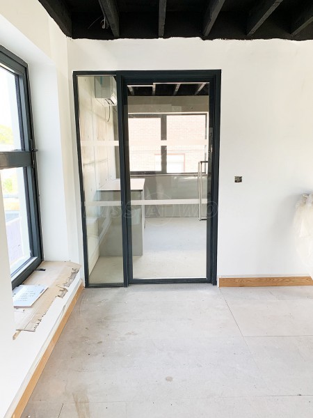 Lilleker Bros Ltd (Rotherham, South Yorkshire): Acoustic Glass Partition with Double Glazed Door Leaf