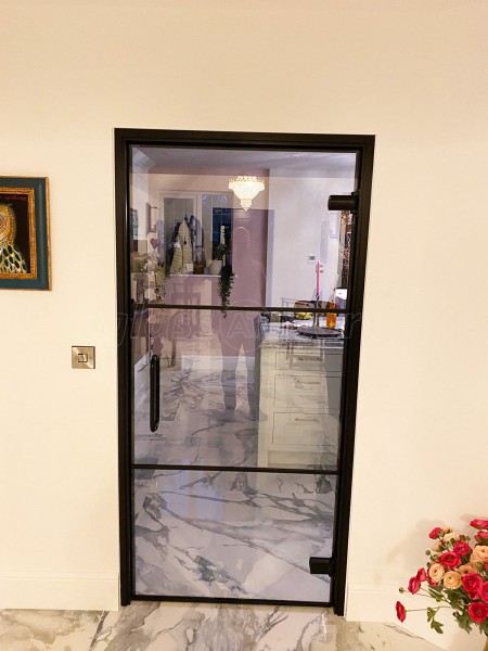 Domestic Project (Kettering, Northamptonshire): Black Framed Metal and Glass Door