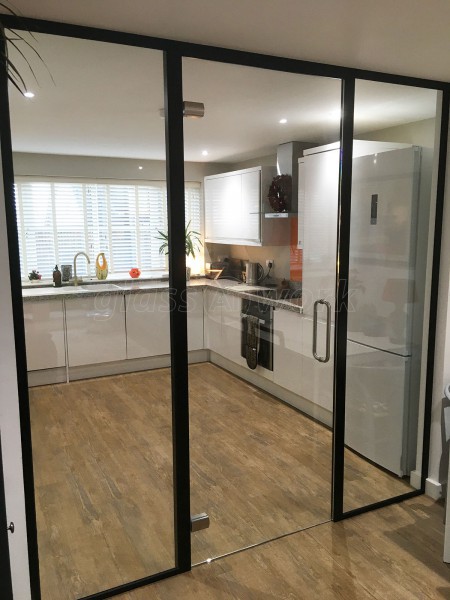 Domestic Project (Norwich, Norfolk): Glass Wall and Door With Black Metal Frame