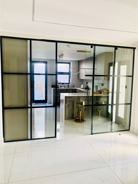 Domestic Project (Chigwell, Essex): Toughened Glass T-Bar Sliding Door Partition