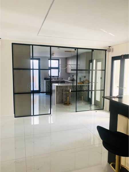 Domestic Project (Chigwell, Essex): Toughened Glass T-Bar Sliding Door Partition