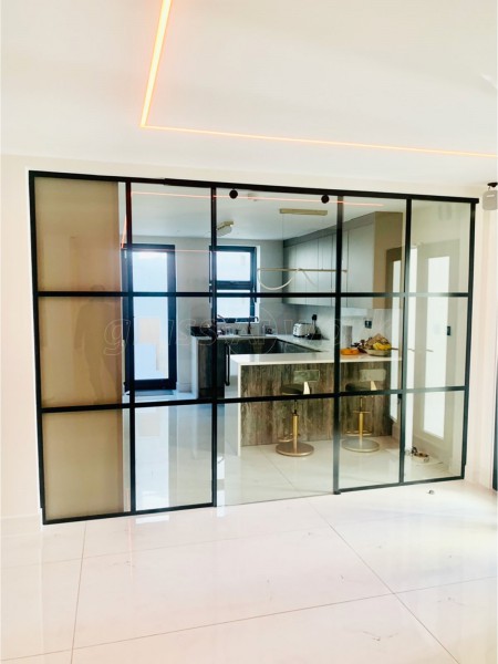 Domestic Project (Chigwell, Essex): Toughened Glass T-Bar Sliding Door Partition