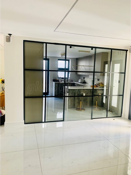 Domestic Project (Chigwell, Essex): Toughened Glass T-Bar Sliding Door Partition