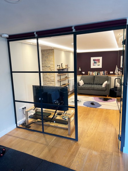 Domestic Project (Stroud, Gloucestershire): T-Bar Black Framed Room Divider With Door