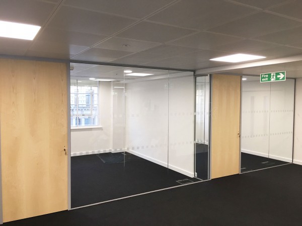 Above & Beyond Construction Ltd (Haymarket, London): Multi-Office Full Floor Fit-Out with Timber Doors & Toughened Glass Partitions