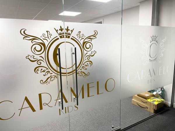 Caramelo Kids (Romford, Essex): Frameless Glass Double Doors With Bespoke Window Film