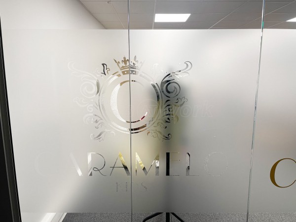 Caramelo Kids (Romford, Essex): Frameless Glass Double Doors With Bespoke Window Film