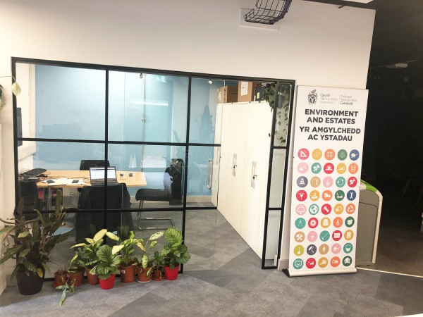 Cardiff Metropolitan University (Cardiff, Caerdydd): Industrial-Look Office Wall With Black Metal Frame and Sliding Door