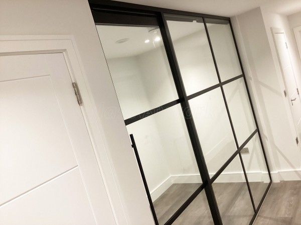 Chase New Homes Limited (Hertford, Hertfordshire): T-Bar Glazed Partitioning with Framed Sliding Door Leaves in multiple Properties