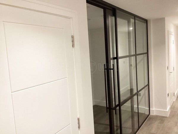 Chase New Homes Limited (Hertford, Hertfordshire): T-Bar Glazed Partitioning with Framed Sliding Door Leaves in multiple Properties