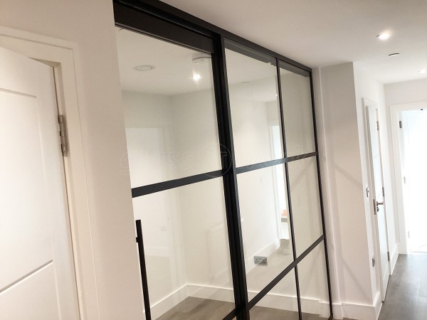 Chase New Homes Limited (Hertford, Hertfordshire): T-Bar Glazed Partitioning with Framed Sliding Door Leaves in multiple Properties