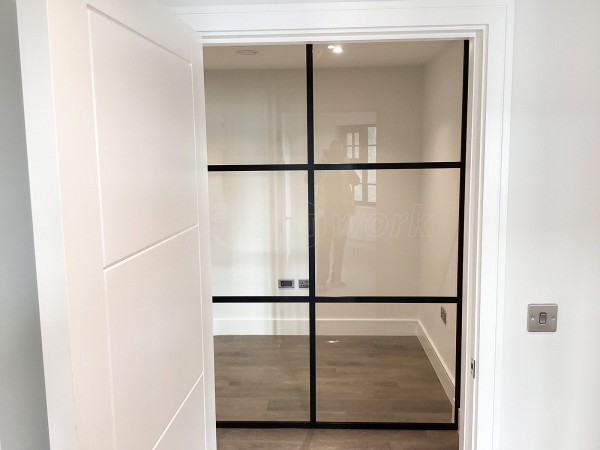 Chase New Homes Limited (Hertford, Hertfordshire): T-Bar Glazed Partitioning with Framed Sliding Door Leaves in multiple Properties