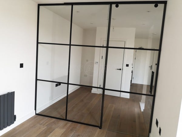 Dawlish Construction (Stepney, London): T-Bar Black Panel Glass Walls and Sliding Doors