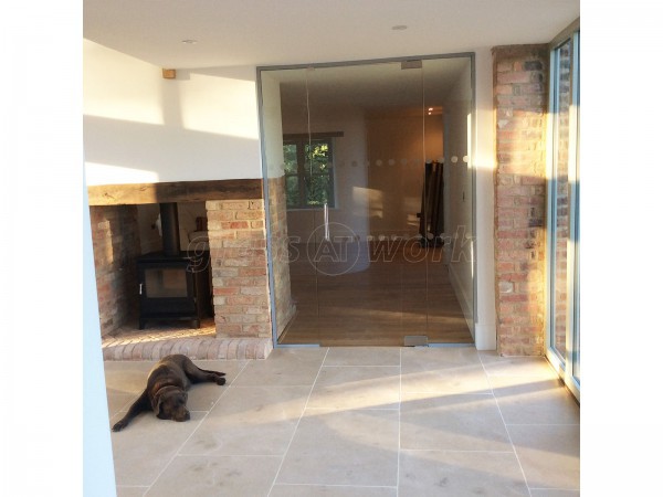 Martin Haynes Construction, Domestic (Towcester, Northamptonshire): Frameless Glass Door and Wall Around Central Fireplace